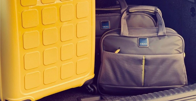 Tripp guaranteed yellow outlet suitcase